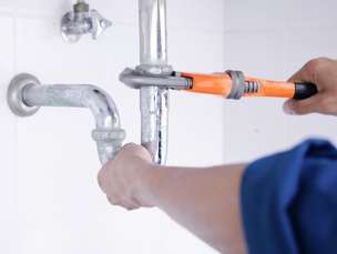 A plumbing technician in Marietta, GA